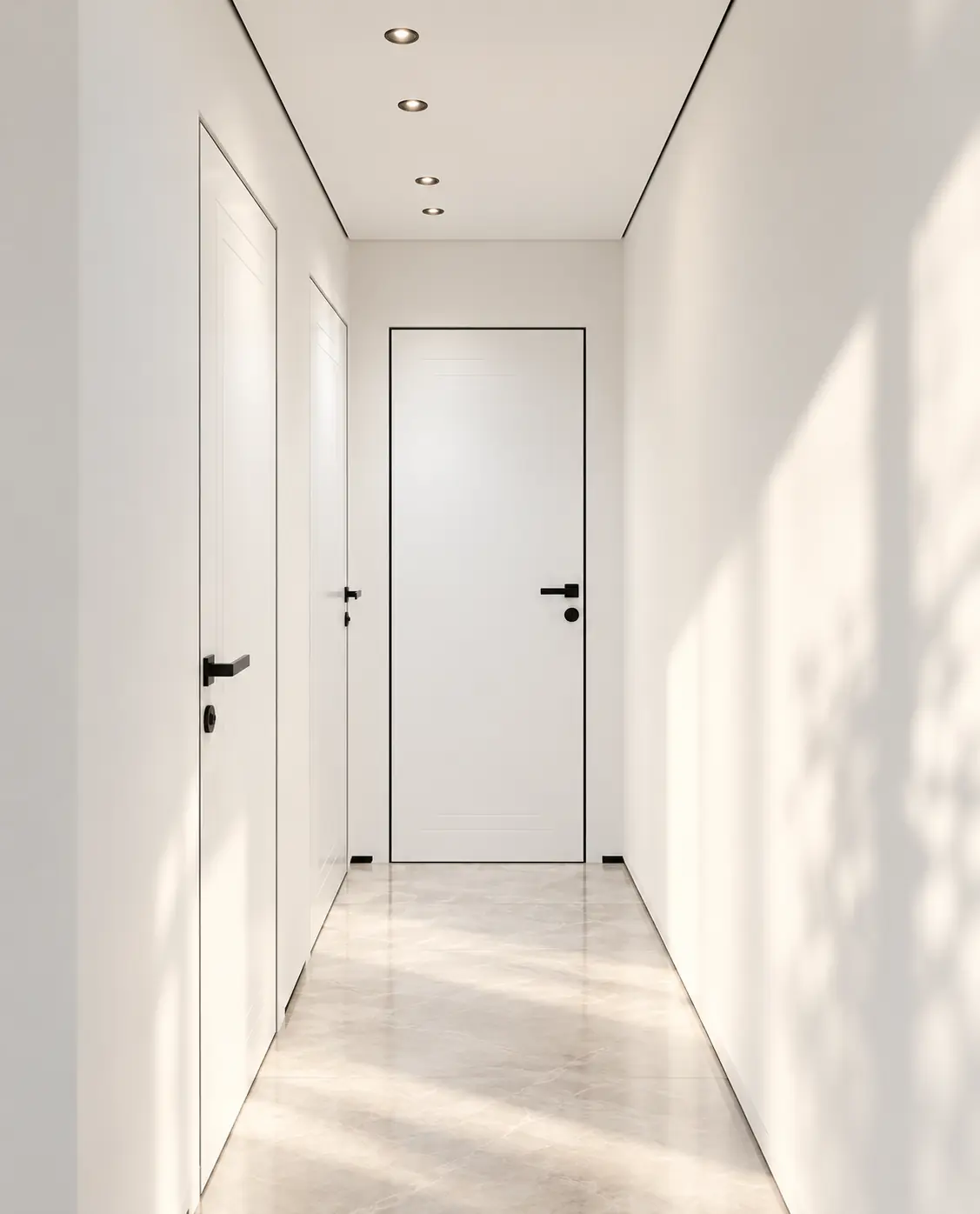White Hermetix interior doors with black levers, set flush along a bright white corridor.
